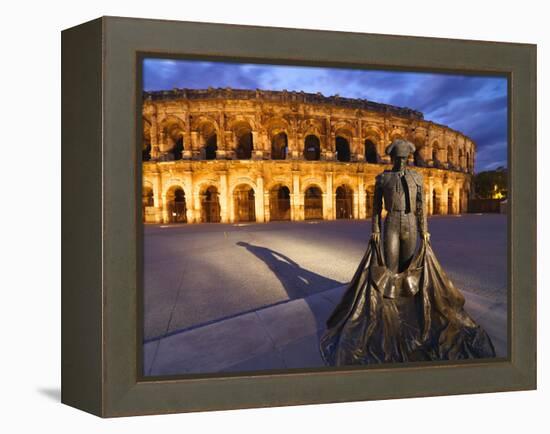 France, Provence, Nimes, Roman Ampitheatre, Toreador Statue at Dusk-Shaun Egan-Framed Premier Image Canvas