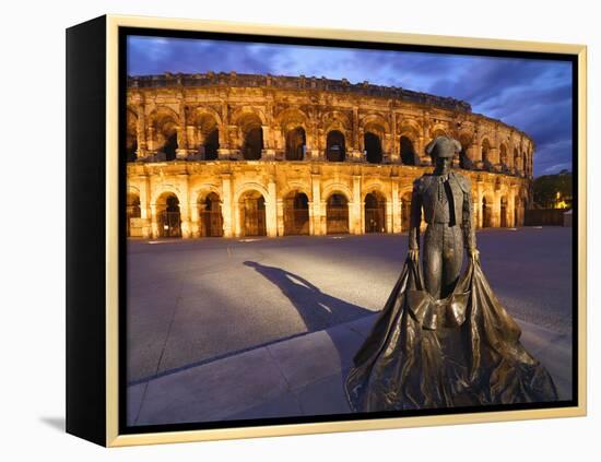 France, Provence, Nimes, Roman Ampitheatre, Toreador Statue at Dusk-Shaun Egan-Framed Premier Image Canvas