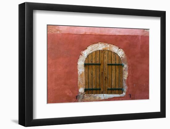 France, Provence, Roussillon. Wooden shutters in red wall.-Jaynes Gallery-Framed Photographic Print