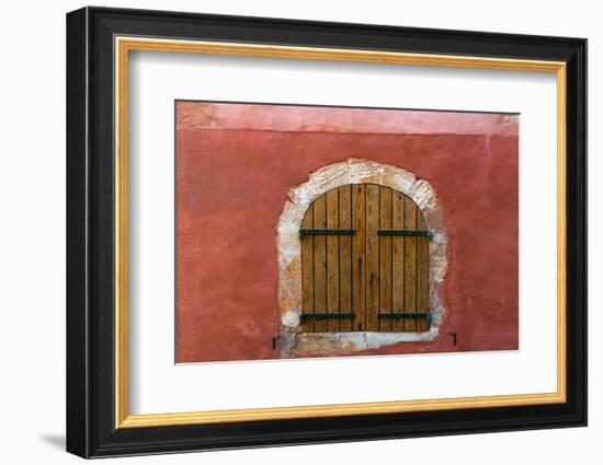 France, Provence, Roussillon. Wooden shutters in red wall.-Jaynes Gallery-Framed Photographic Print