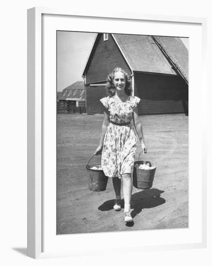 Francis Larson Collecting Eggs on Her Farm-Bob Landry-Framed Premium Photographic Print