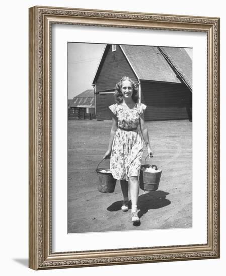 Francis Larson Collecting Eggs on Her Farm-Bob Landry-Framed Photographic Print