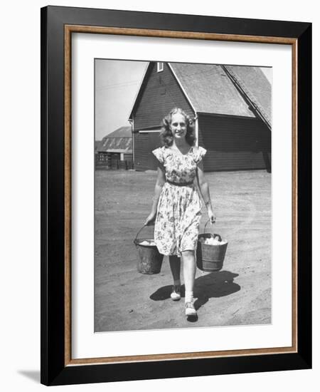 Francis Larson Collecting Eggs on Her Farm-Bob Landry-Framed Photographic Print