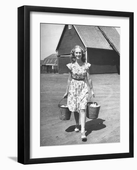Francis Larson Collecting Eggs on Her Farm-Bob Landry-Framed Photographic Print