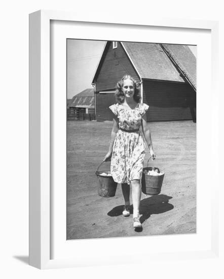 Francis Larson Collecting Eggs on Her Farm-Bob Landry-Framed Photographic Print