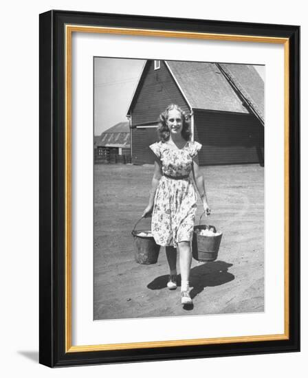 Francis Larson Collecting Eggs on Her Farm-Bob Landry-Framed Photographic Print