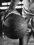 Basketball Held by Player Wilt Chamberlain, 1956-Frank Scherschel-Mounted Photographic Print