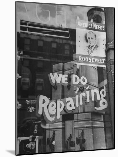 Franklin D. Roosevelt Poster Hanging in a Repair Store Window on Madison Avenue-John Phillips-Mounted Photographic Print