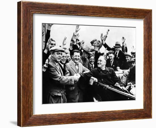 Franklin Roosevelt in the Back Seat of His Car, Surrounded by Cheering Citizens, 1930s-null-Framed Photo