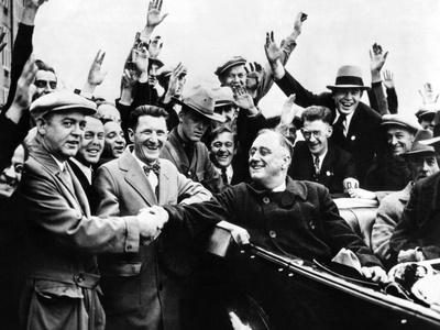 franklin-roosevelt-in-the-back-seat-of-his-car-surrounded-by-cheering-citizens-1930s_u-l-ph7ife0.jpg