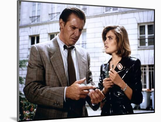 FRANTIC, 1988 directed by ROMAN POLANSKI Harrison Ford and Emmanuelle Seigner (photo)-null-Mounted Photo