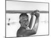 Freckled Surfer Larry Shaw Carrying Surfboard on His Head-Allan Grant-Mounted Photographic Print