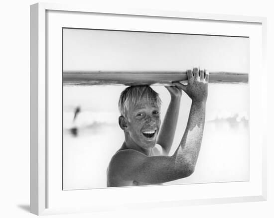 Freckled Surfer Larry Shaw Carrying Surfboard on His Head-Allan Grant-Framed Photographic Print