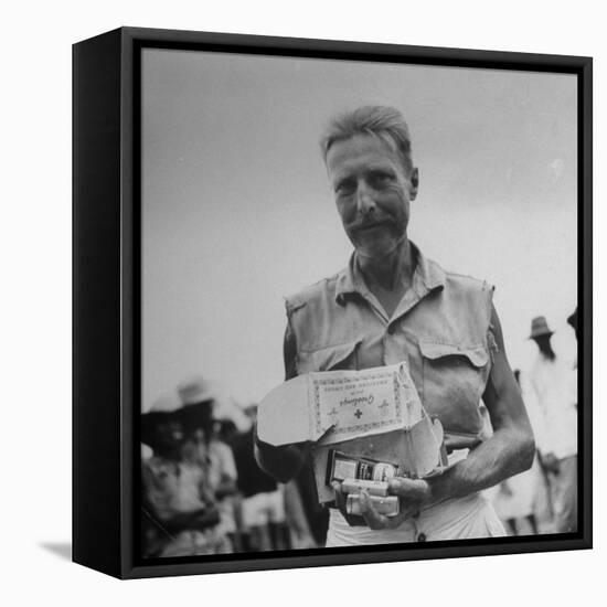 Freed American Pow Holding Red Cross Supplies after His Release from a Japanese Prison Camp-Carl Mydans-Framed Premier Image Canvas