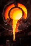 Steel Worker in Protective Clothing Raking Furnace in an Industrial Foundry-FreeProd33-Framed Premier Image Canvas