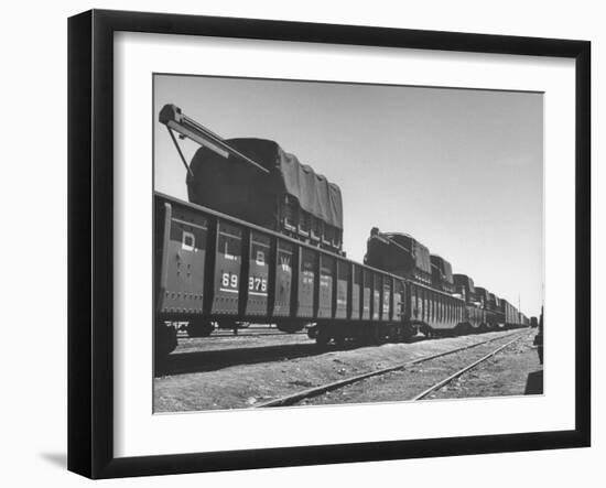 Freight Trains Transporting Trucks and Cables Westbound-null-Framed Photographic Print