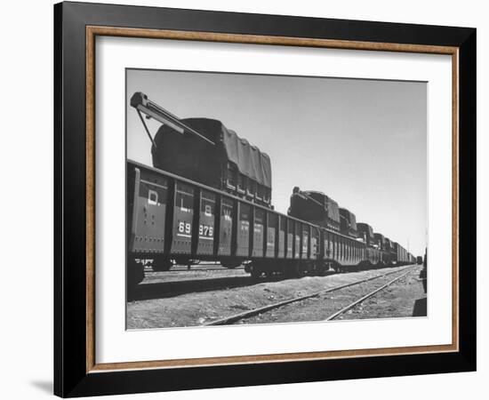 Freight Trains Transporting Trucks and Cables Westbound-null-Framed Photographic Print