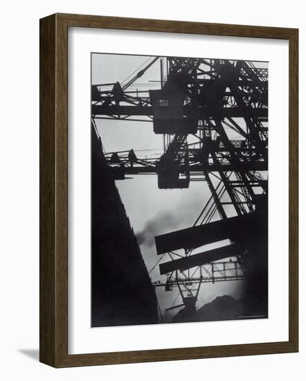 Freighter Berwind Unloading Coal at Great Lakes Pier-Margaret Bourke-White-Framed Photographic Print