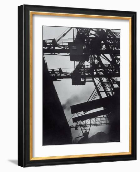 Freighter Berwind Unloading Coal at Great Lakes Pier-Margaret Bourke-White-Framed Photographic Print