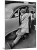 French Actor Jacques Tati Comically Getting Out of a Cab-Yale Joel-Mounted Premium Photographic Print