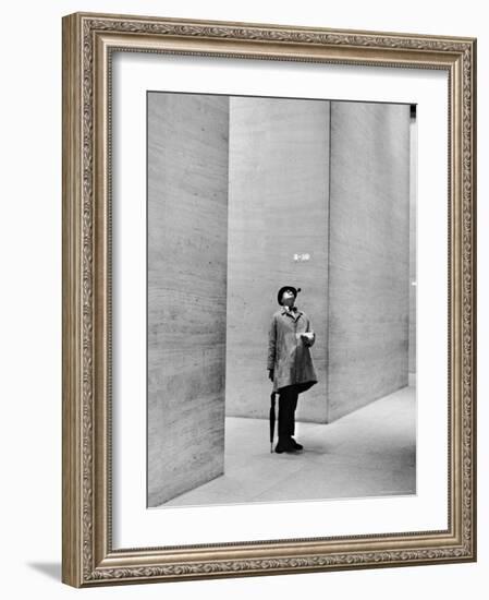 French Actor Jacques Tati Looking at the High Ceiling of an Office Lobby-Yale Joel-Framed Premium Photographic Print