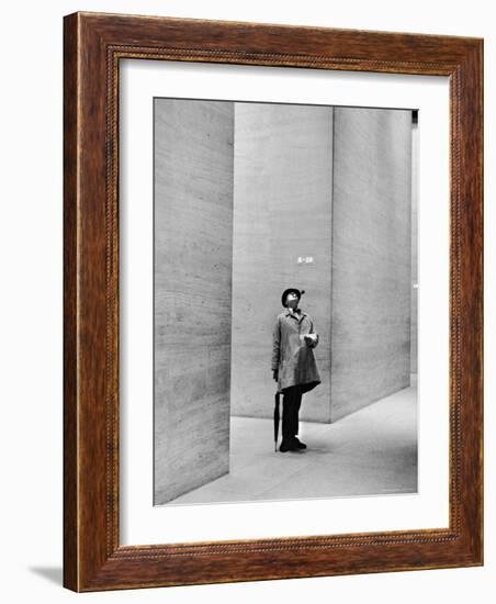 French Actor Jacques Tati Looking at the High Ceiling of an Office Lobby-Yale Joel-Framed Premium Photographic Print