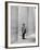 French Actor Jacques Tati Looking at the High Ceiling of an Office Lobby-Yale Joel-Framed Premium Photographic Print