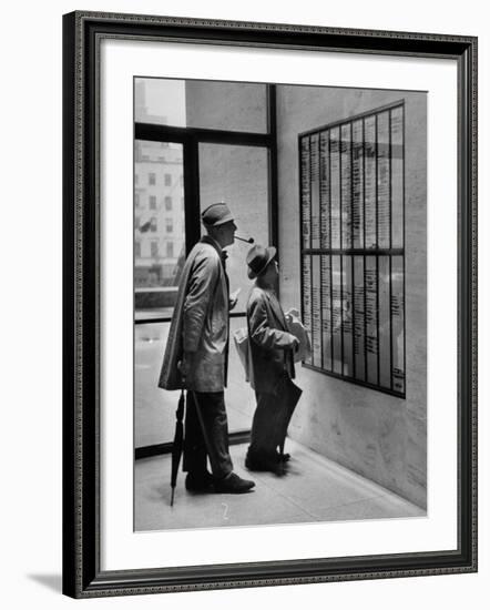 French Actor Jacques Tati Looking at the Names of a Building-Yale Joel-Framed Premium Photographic Print