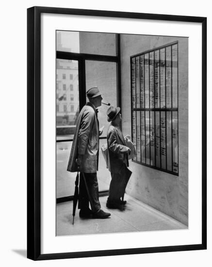 French Actor Jacques Tati Looking at the Names of a Building-Yale Joel-Framed Premium Photographic Print