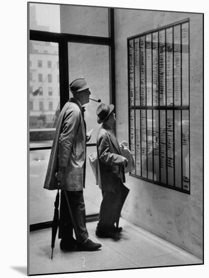 French Actor Jacques Tati Looking at the Names of a Building-Yale Joel-Mounted Premium Photographic Print
