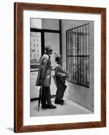 French Actor Jacques Tati Looking at the Names of a Building-Yale Joel-Framed Premium Photographic Print