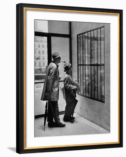 French Actor Jacques Tati Looking at the Names of a Building-Yale Joel-Framed Premium Photographic Print