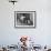 French Actor Jacques Tati Talking to a Couple of Dogs-Yale Joel-Framed Premium Photographic Print displayed on a wall