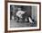 French Actor Jacques Tati Talking to a Couple of Dogs-Yale Joel-Framed Premium Photographic Print