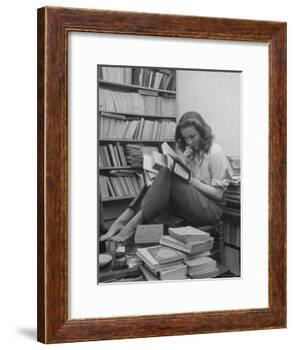 French Actress Barbara Laage, Alone in Her Apartment Reading-Nina Leen-Framed Photographic Print