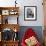 French Actress Barbara Laage, Alone in Her Apartment Reading-Nina Leen-Framed Photographic Print displayed on a wall