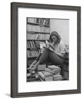 French Actress Barbara Laage, Alone in Her Apartment Reading-Nina Leen-Framed Photographic Print