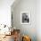 French Actress Barbara Laage, Alone in Her Apartment Reading-Nina Leen-Framed Photographic Print displayed on a wall