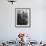 French Actress Barbara Laage Trying on a Hat in Shop Where Her Sister Works-null-Framed Photographic Print displayed on a wall