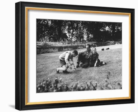 French Author, Albert Camus at His Home, Sitting in Garden with His Young Son and Daughter-Loomis Dean-Framed Photographic Print