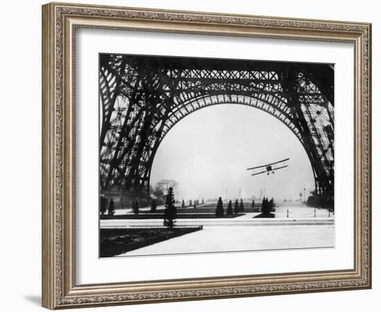 French Aviator Lieutenant Collot Successfully Flies His Biplane Beneath the Tour Eiffel-null-Framed Photographic Print