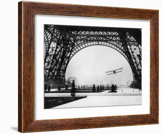 French Aviator Lieutenant Collot Successfully Flies His Biplane Beneath the Tour Eiffel-null-Framed Photographic Print