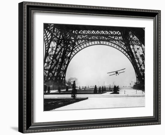 French Aviator Lieutenant Collot Successfully Flies His Biplane Beneath the Tour Eiffel-null-Framed Photographic Print