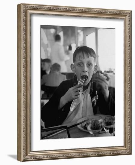 French Boy Andre Poindeeault Mastering a Big Bite-Nat Farbman-Framed Photographic Print