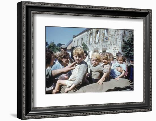 French Children in the Town of Avranches Sitting on Us Military Jeep, Normandy, France, 1944-Frank Scherschel-Framed Photographic Print