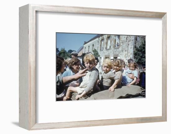 French Children in the Town of Avranches Sitting on Us Military Jeep, Normandy, France, 1944-Frank Scherschel-Framed Photographic Print