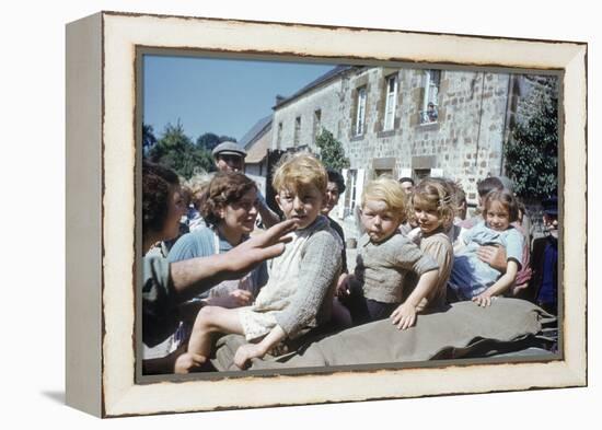 French Children in the Town of Avranches Sitting on Us Military Jeep, Normandy, France, 1944-Frank Scherschel-Framed Premier Image Canvas