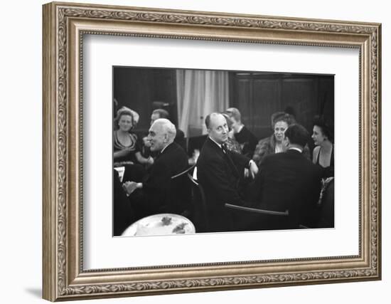 French Designer Christian Dior Drinking with Unidentified Others at a Bar, Paris, November 1947-Frank Scherschel-Framed Photographic Print