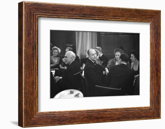 French Designer Christian Dior Drinking with Unidentified Others at a Bar, Paris, November 1947-Frank Scherschel-Framed Photographic Print