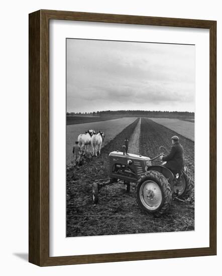 French Farmer Georges Raoul Fremond Trying Out His New Massey-Harris Tractor Obtained Through Eca-null-Framed Photographic Print